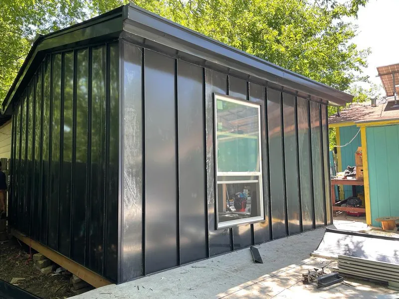 Black standing seam metal wall panels for Roof Inspection in Amity