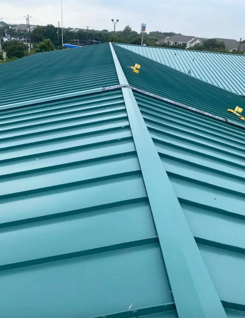 Green commercial metal roof ridge and valley for Metal Roof Repair in Amity