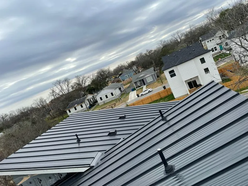 Standing seam metal roof panels with vents for Skylight Repair in Amity